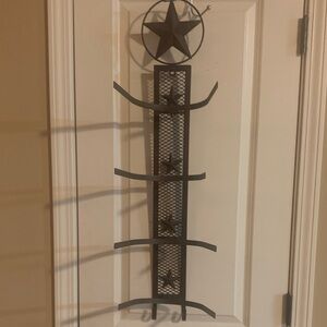 Rustic metal cowboy hat holder